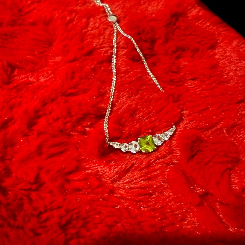 Sterling Silver peridot bolo bracelet with white sapphires. - Picture 5 of 9
